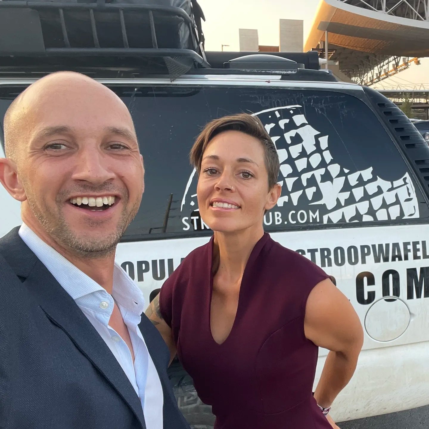 Photo of Chantal and Tako in front of the Stroop Club car.